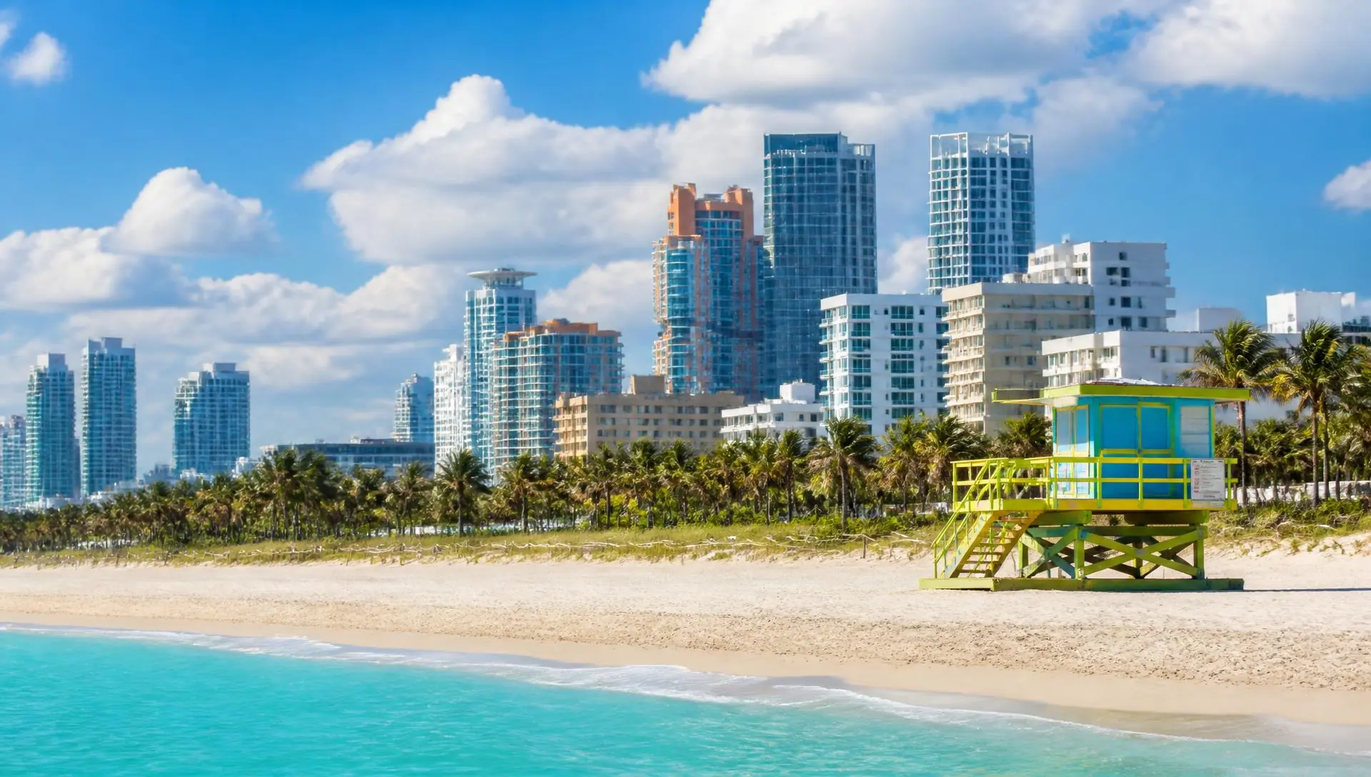 Miami Beach shoreline and skyline above turquoise Atlantic water